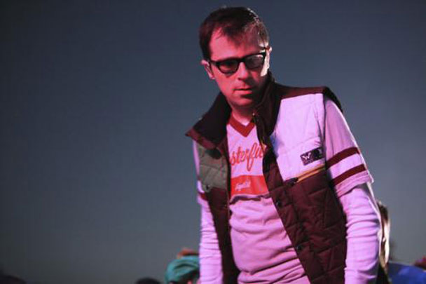 Rivers Cuomo in a Weezer Hurley vest
