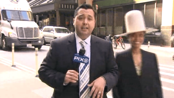 Erykah Badu Interrupts Live News Broadcast, Tries to Kiss Anchor