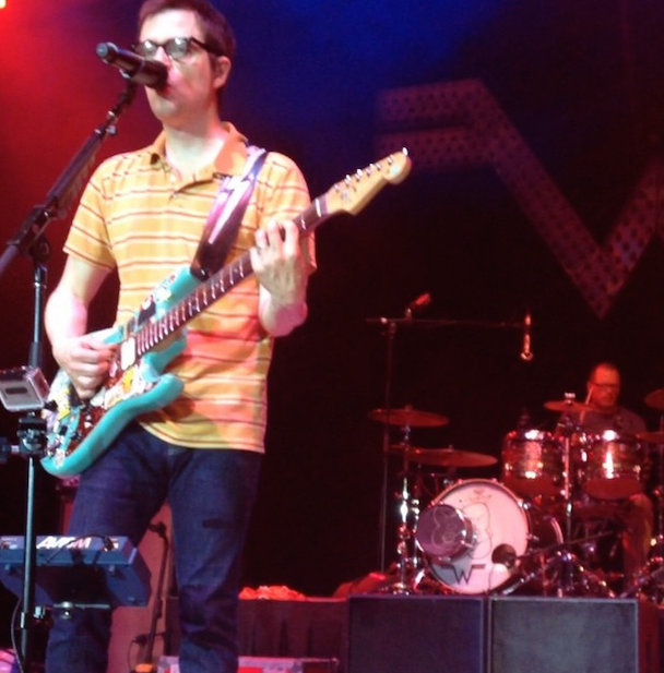 Watch Weezer's Drummer Catch A Fan's Frisbee Without Missing A Beat Of "Beverly Hills"