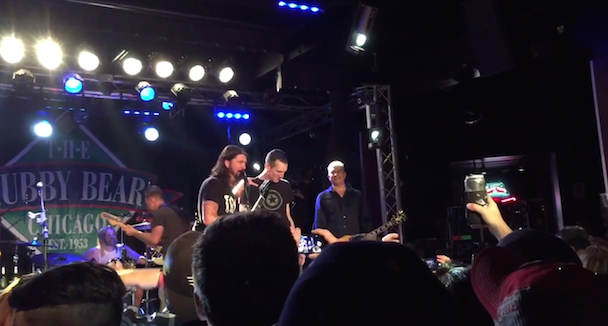 Watch Dave Grohl Relive His First Concert Experience By Bringing Naked Raygun Singer Onstage In Chicago