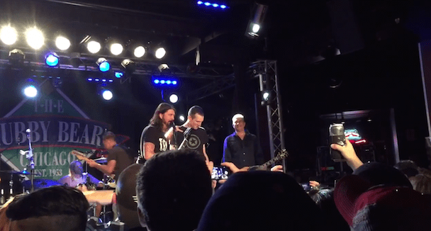 Watch Dave Grohl Relive His First Concert Experience By Bringing Naked Raygun Singer Onstage In Chicago