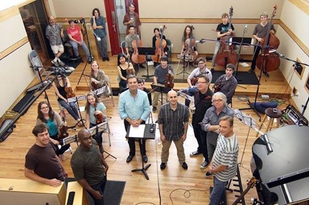 Watch R.E.M.'s Mike Mills Perform His "Concerto For Violin & Rock Band"