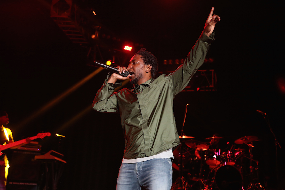Watch Kendrick Lamar Bring A Fan Onstage To Rap "m.A.A.d city" At Sweetlife Festival