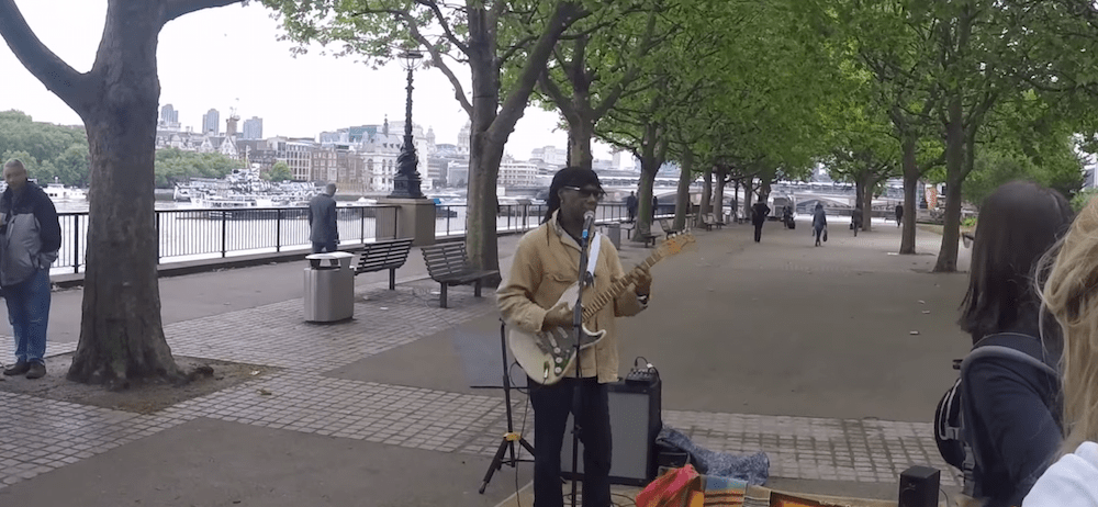 Watch Nile Rodgers Make $20 Busking In London