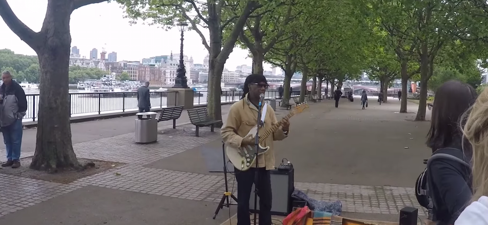 Watch Nile Rodgers Make $20 Busking In London