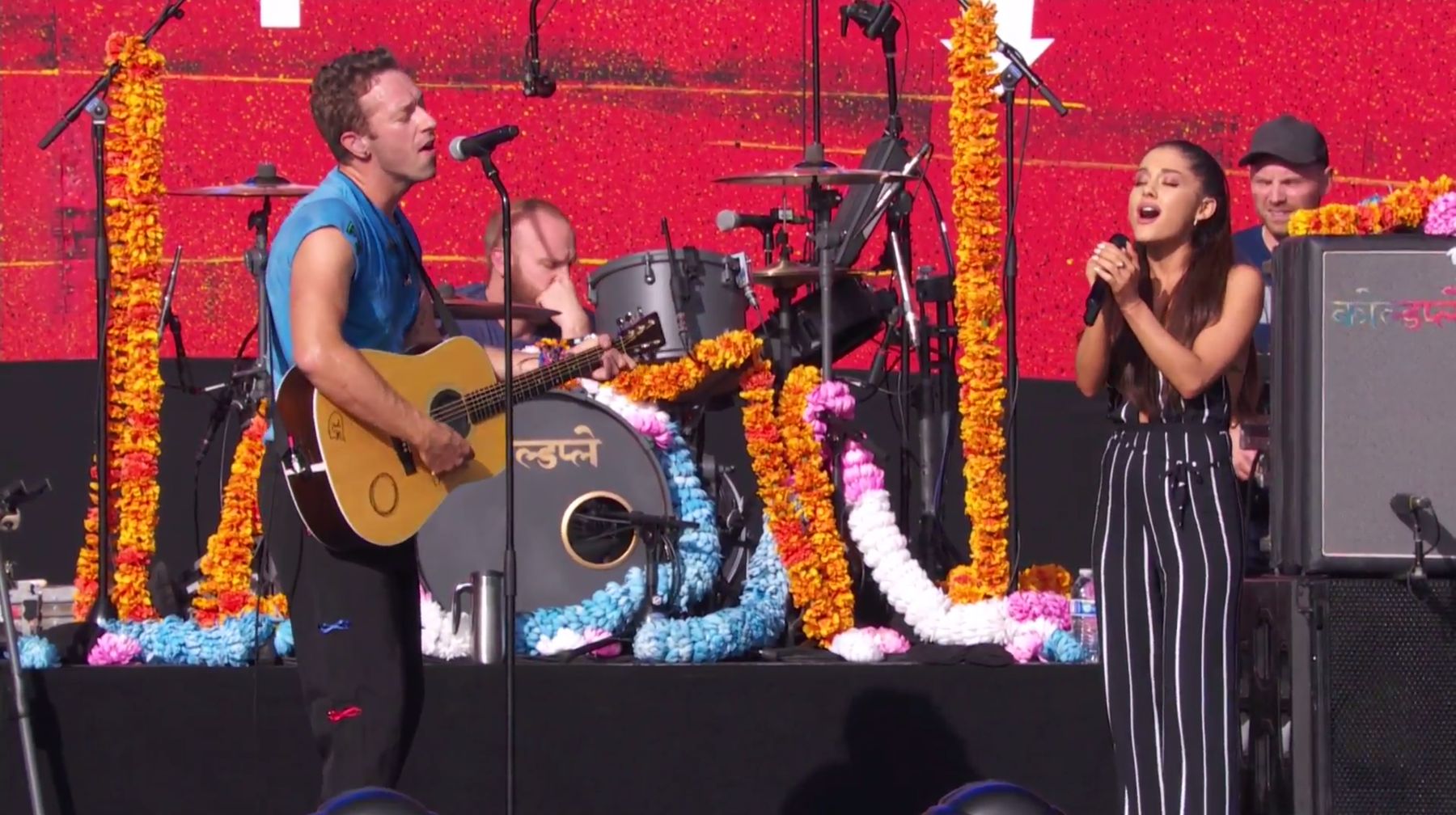 Watch Coldplay Debut New Song "Amazing Day," Perform With Ariana Grande At Global Citizen Fest
