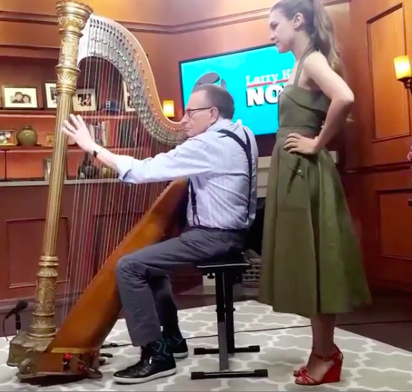Watch Joanna Newsom Teach Larry King How To Play Harp