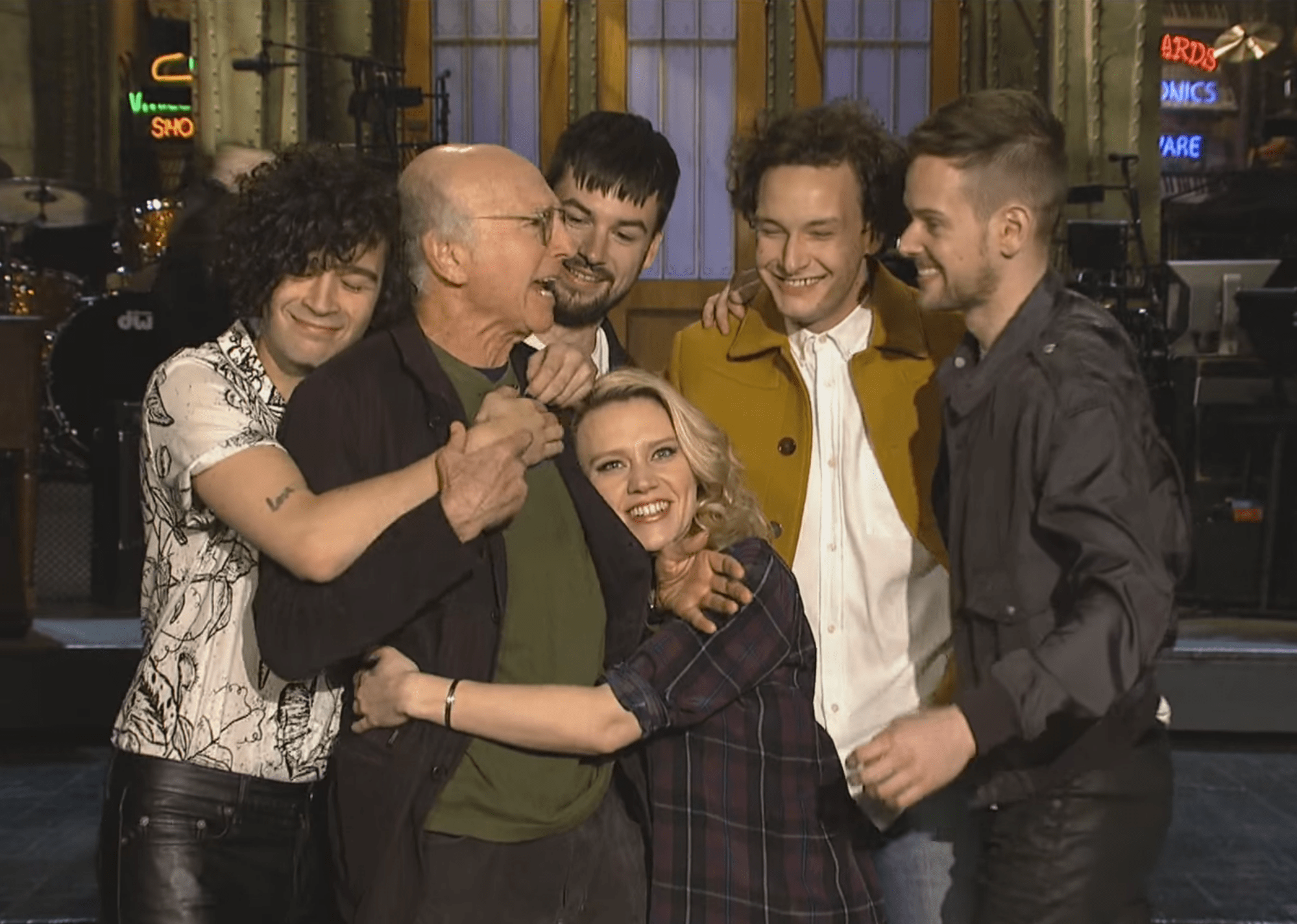 Watch Larry David Get A Hug From The 1975 In Their SNL Promo