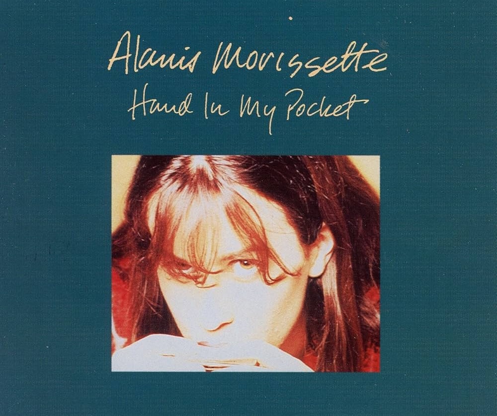 one hand in my pocket the other smoking a cigarette Alanis Morissette Hand in My Pocket (2015