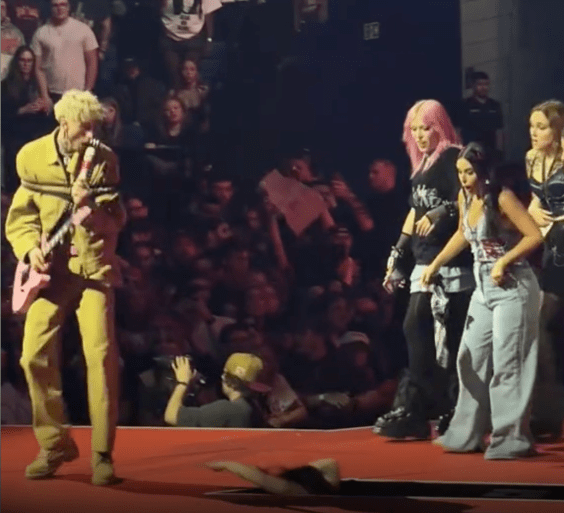 Machine Gun Kelly Fan Falls Through Opening In Stage