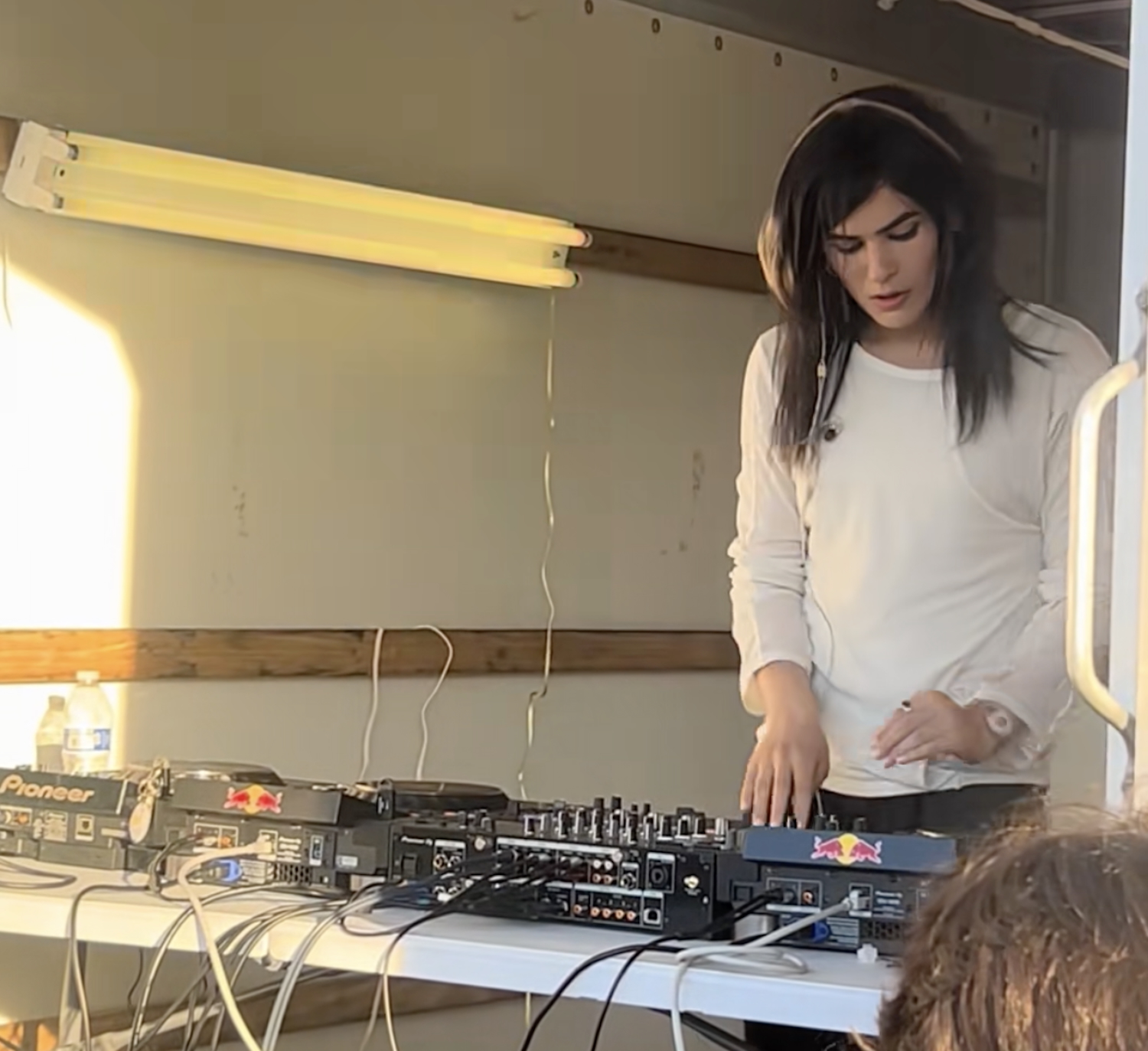 Underscores Follows Set At Dry Cleaners With Guest-Filled U-Haul Pop-Up